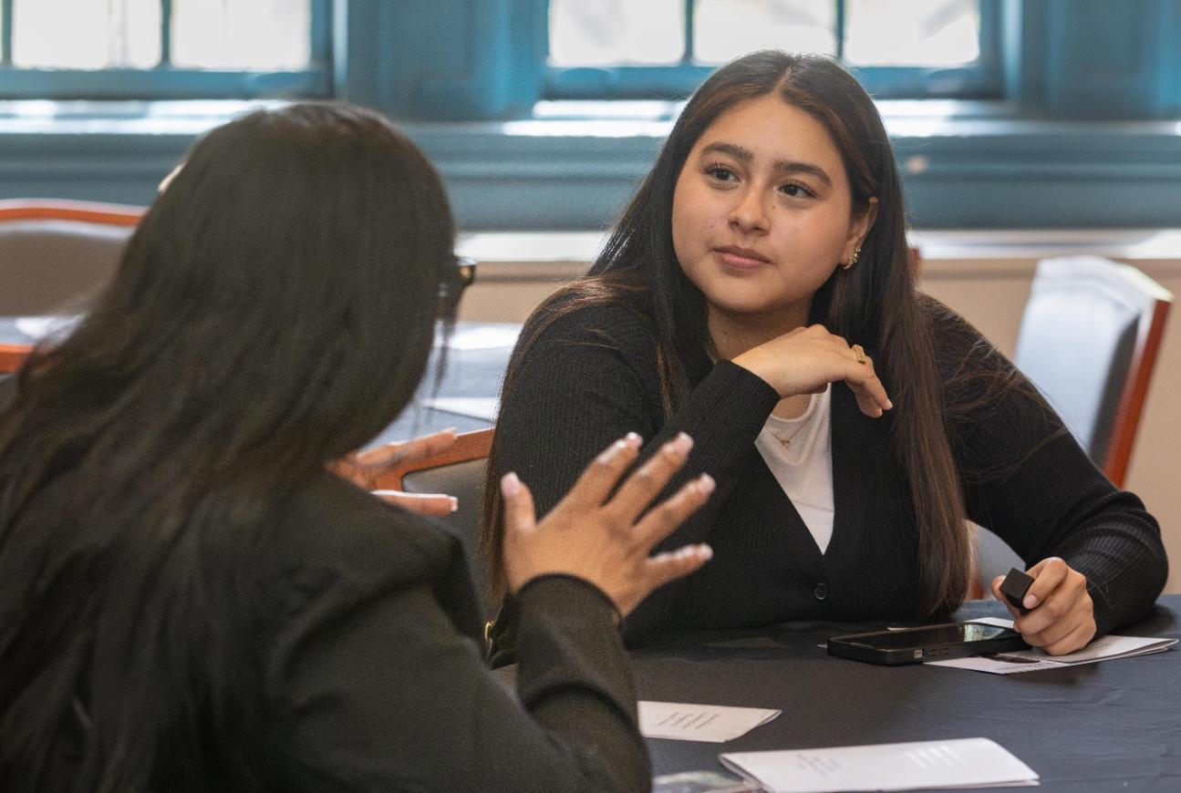 Students having a meeting at a table