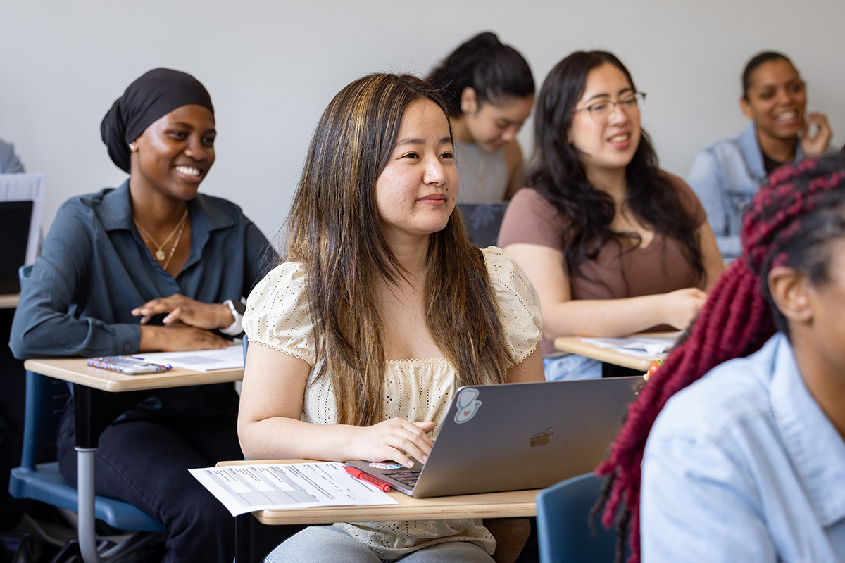Photo of students sitting in a classroom