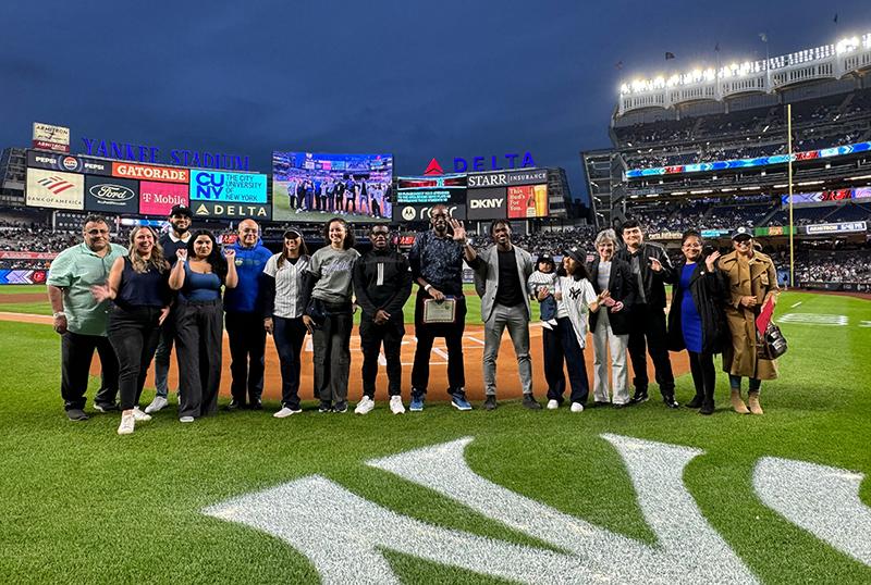 Lehman College’s 2024 class of the Yankees-CUNY Sports Management Mentoring program received certificates at Yankee Stadium. (Photo by Janel Martinez)