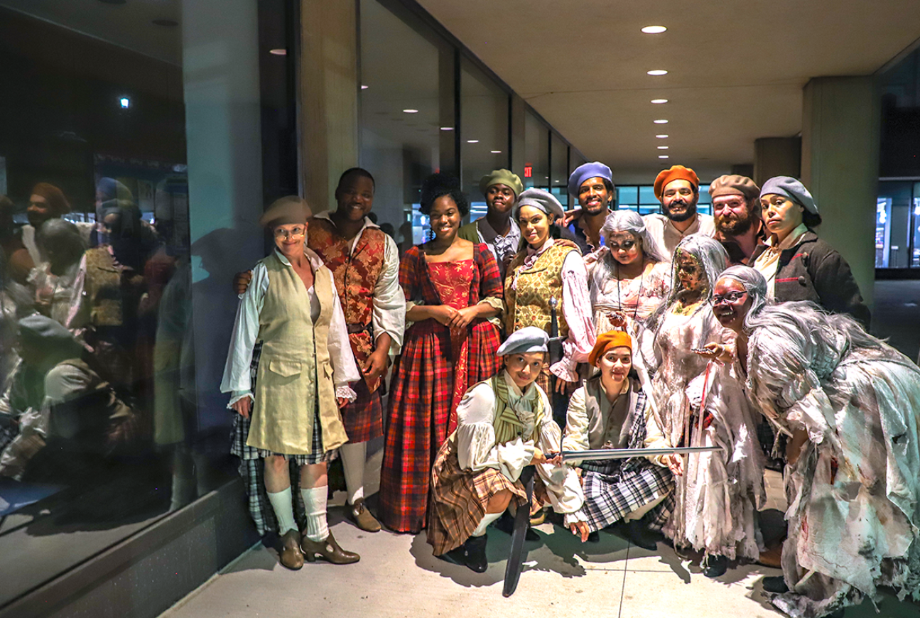 Rahilou Bah and Jamilla Gillette map out their next destination during the Office of Campus Life Scavenger Hunt. (Photo by Lehman College Multimedia Center)