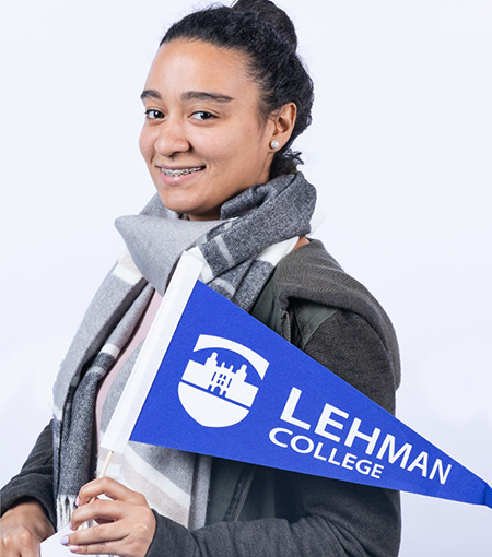 Woman with Lehman Banner