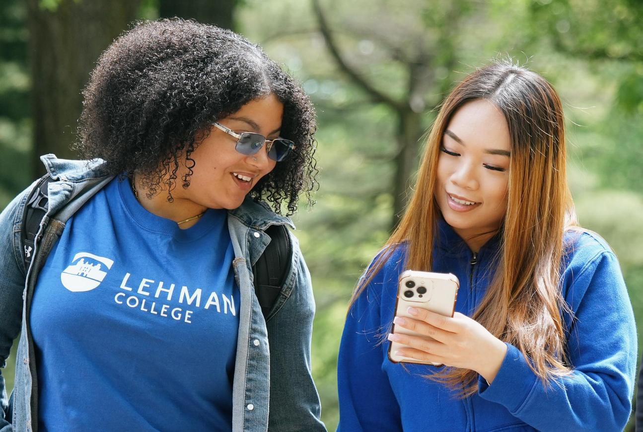 Two Lehman Student Reviewing Social Media Guidelines