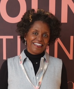 headshot  Deborah Diaite at conference