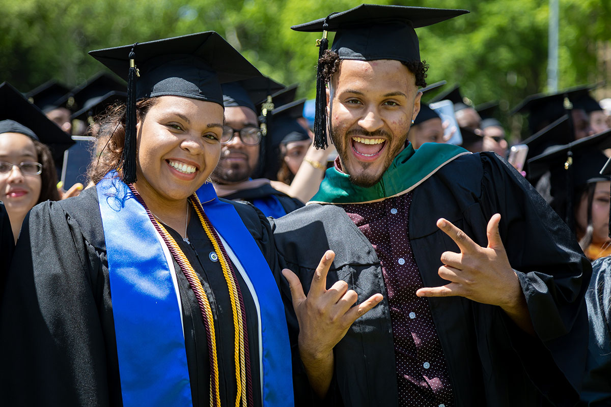 Photo of two student in Commencement