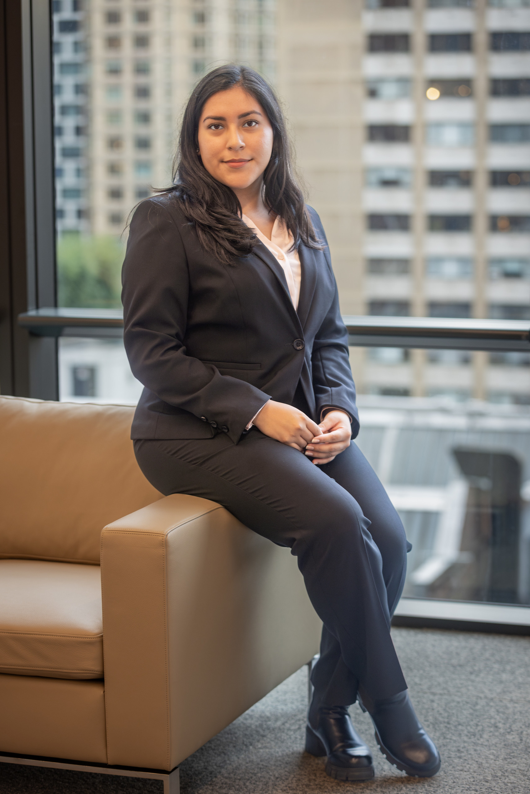 Women leader sitting on a chair