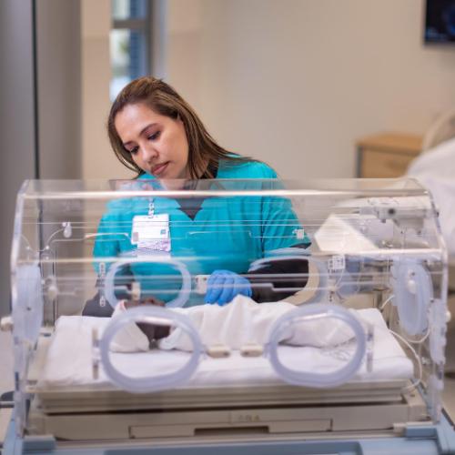 Nursing working in a medical suite