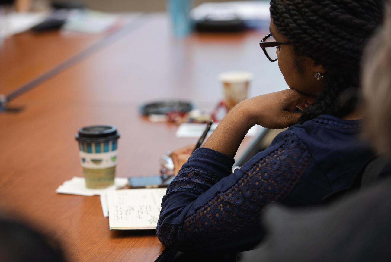 Student Sitting at table writting