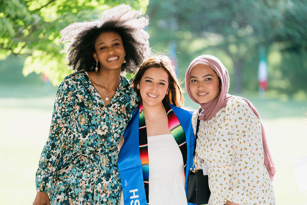 Photo of three students smiling