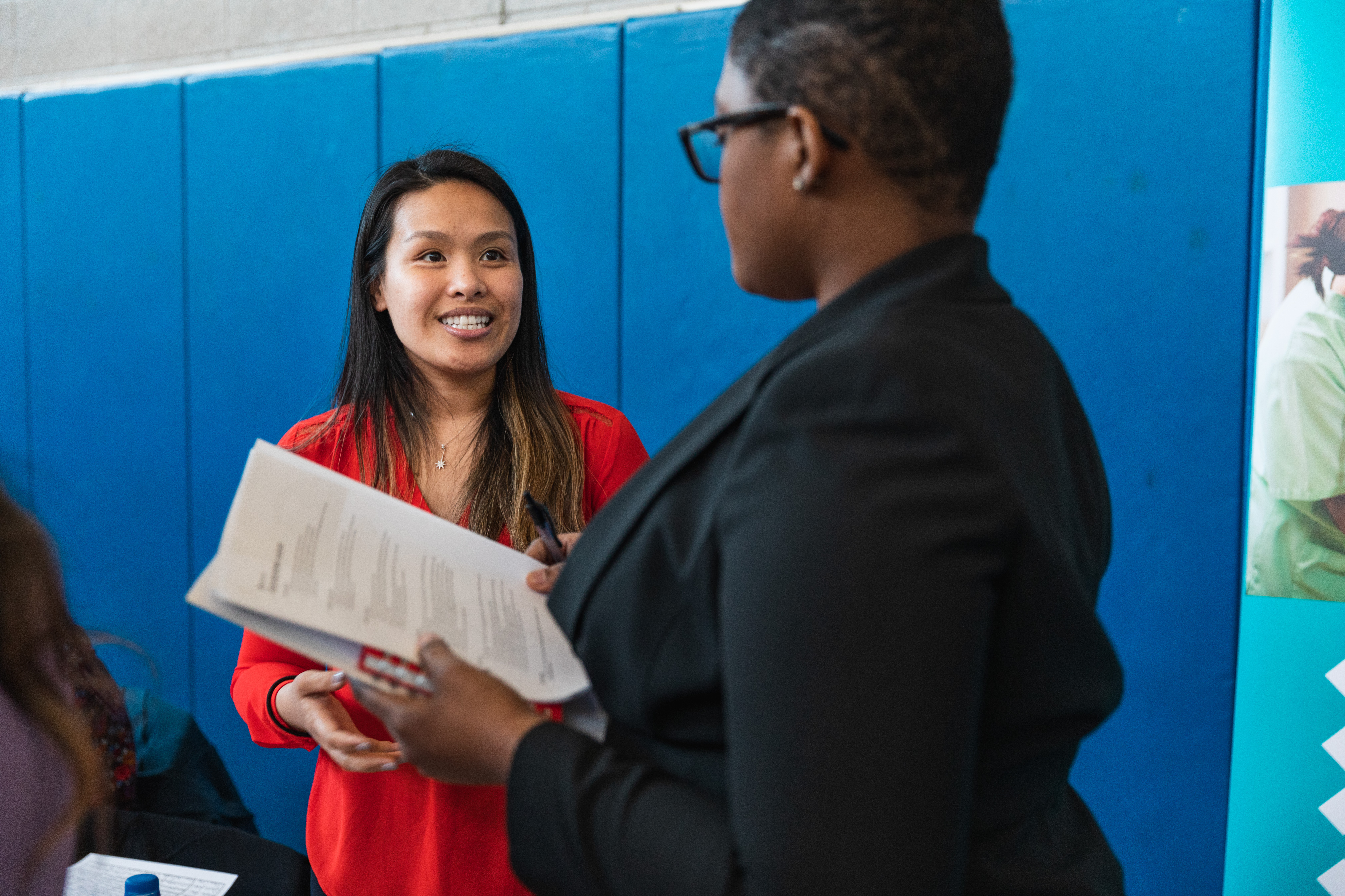 Photo of two women talking