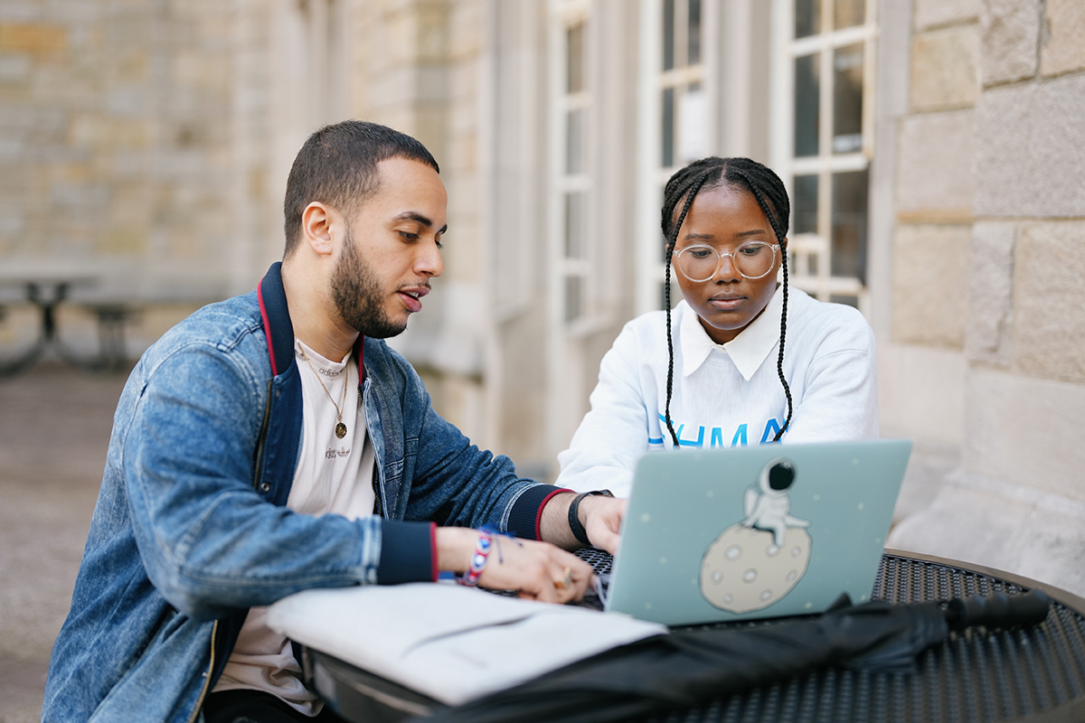 Photo of two students studying